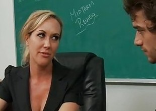 Blonde teacher Brandi Love riding cock in classroom