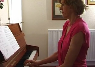 Uma at the piano